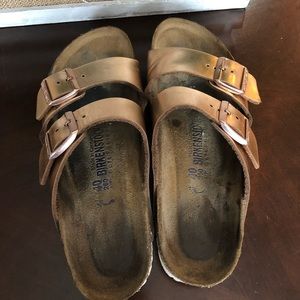 Size 40 used rose gold Arizona Birkenstock’s.